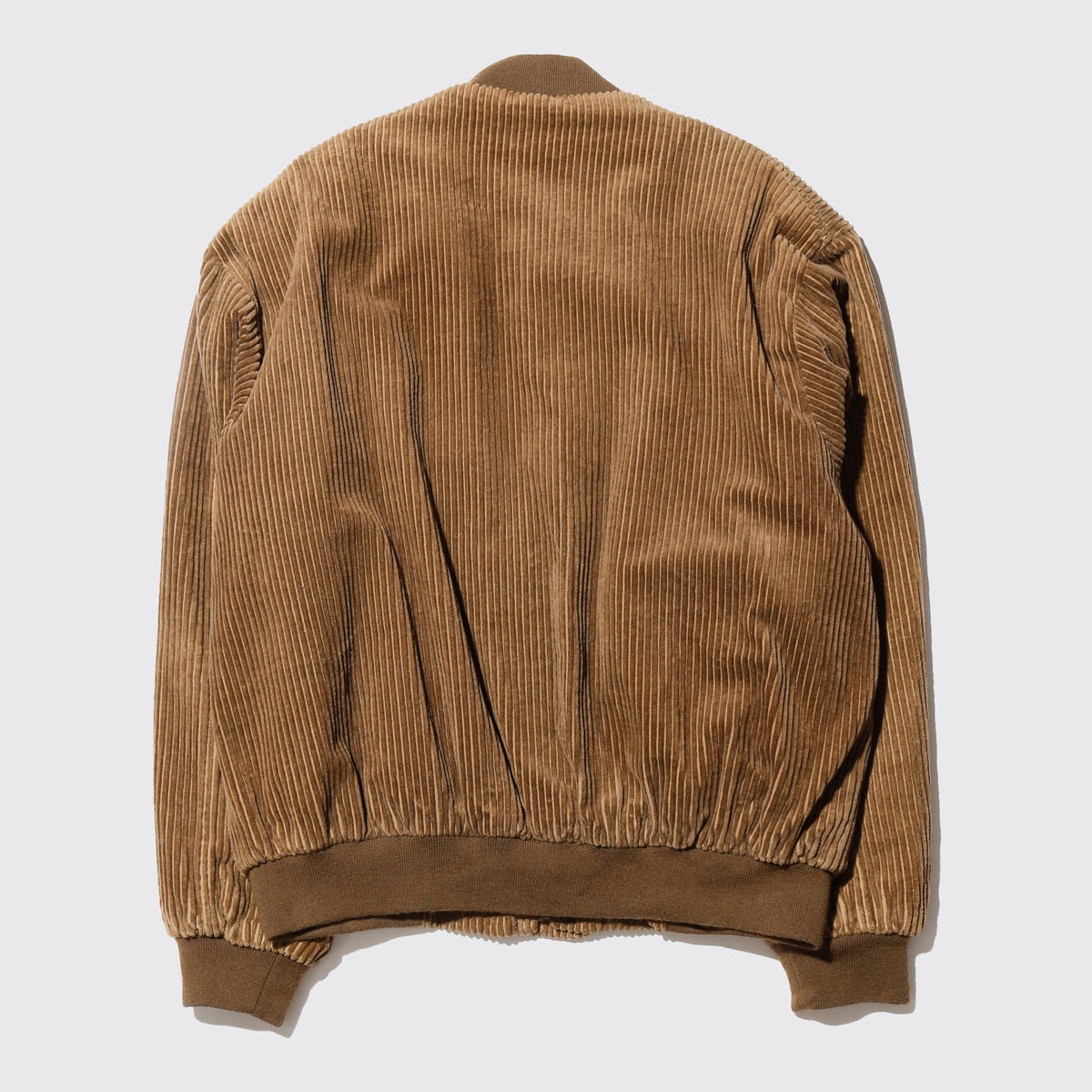 vintage corduroy bomber jacket, with copper badge
