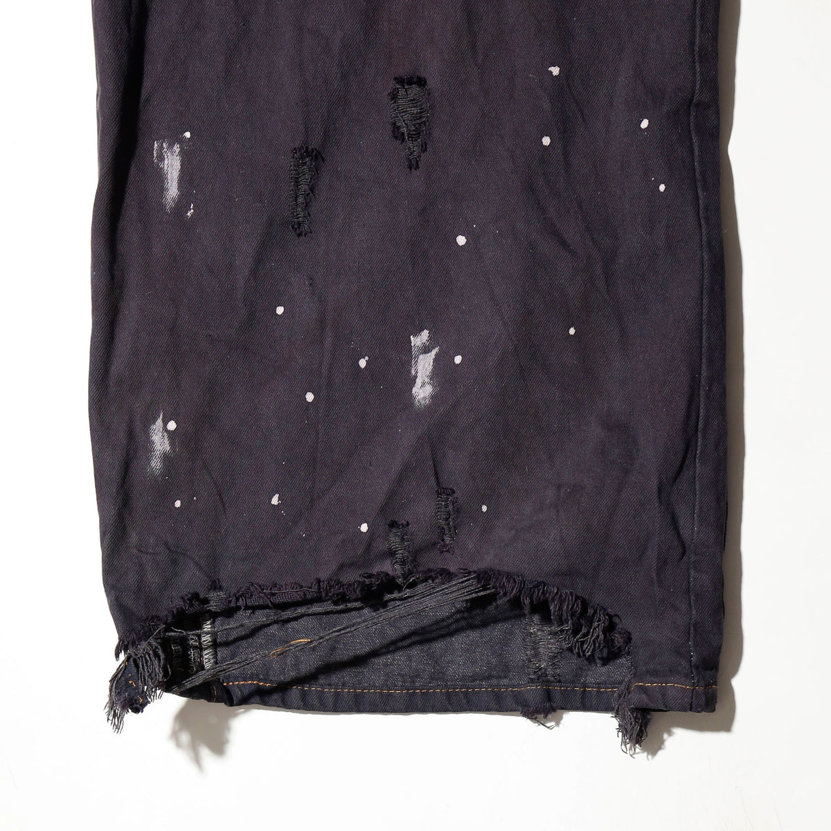 *one-off broken/repaired wide leg jeans