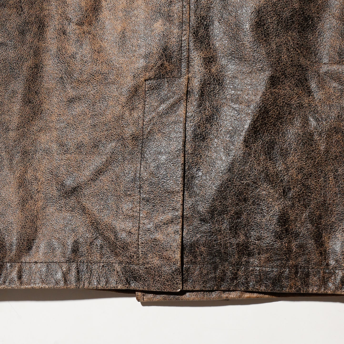 vintage faded leather coat