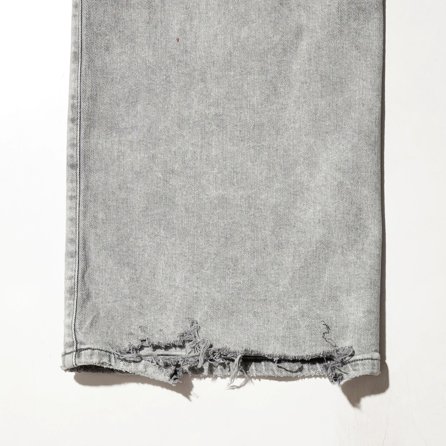 *one-off broken layered jeans