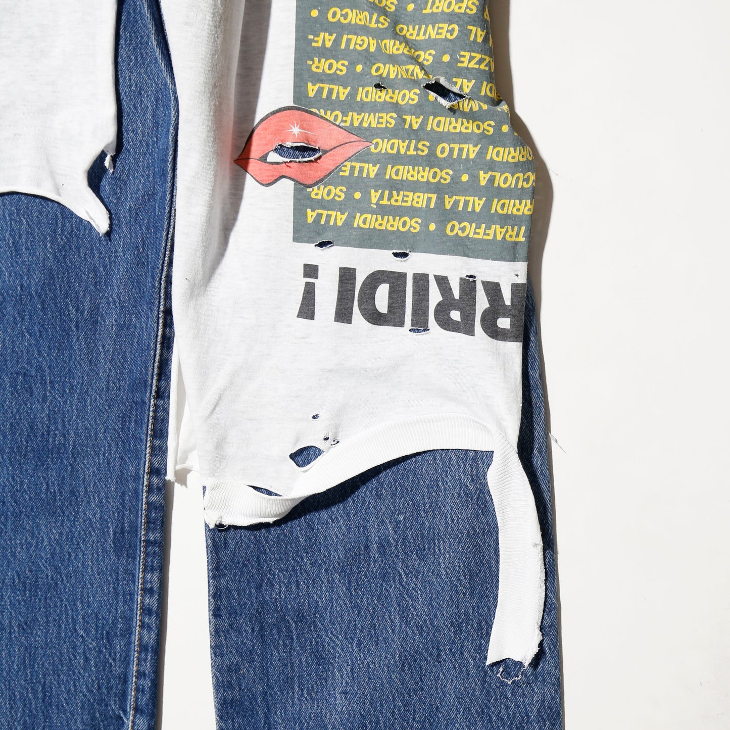 *one-off broken layered jeans
