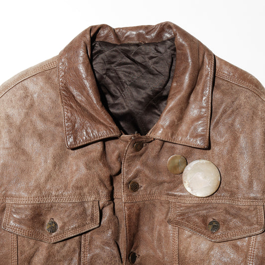 vintage faded leather trucker jacket , with aging kapper badge