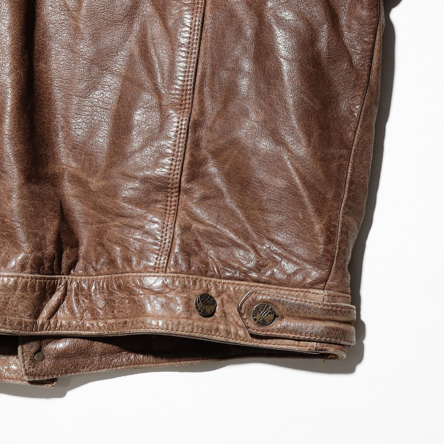 vintage faded leather trucker jacket , with aging kapper badge