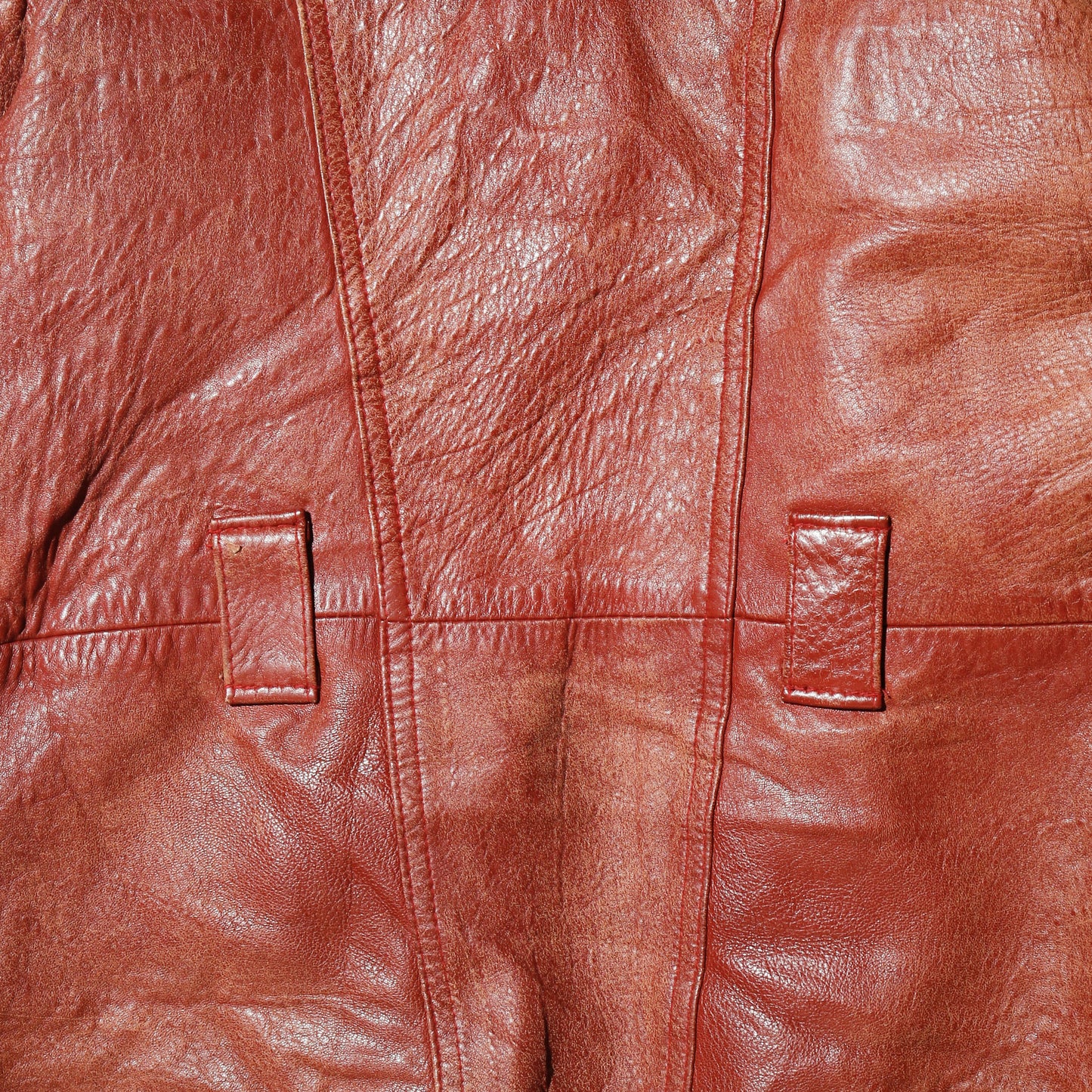 vintage reddish leather riders jacket , with badge