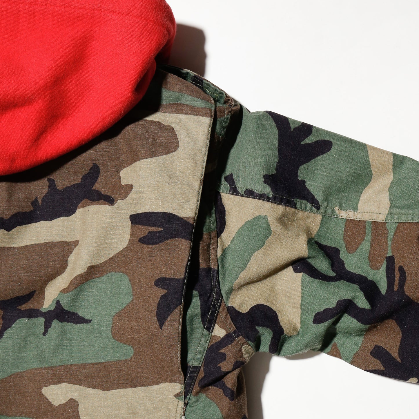 *one-off cropped field jacket , with hoodie/kapper badge