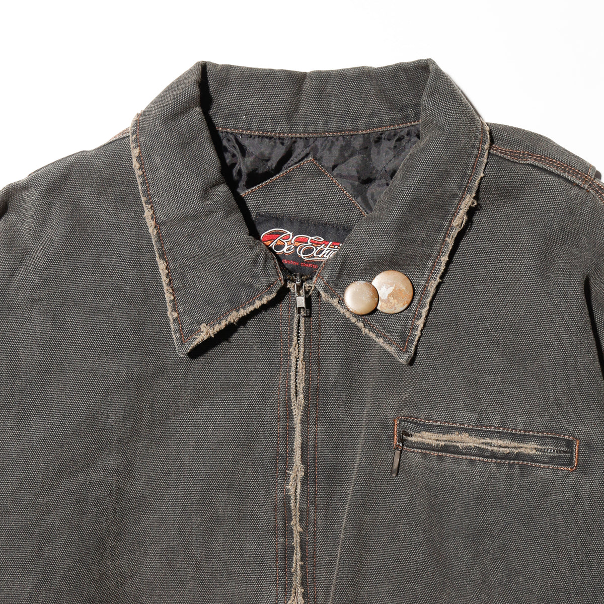 vintage frayed dust work jacket ,with copper badge