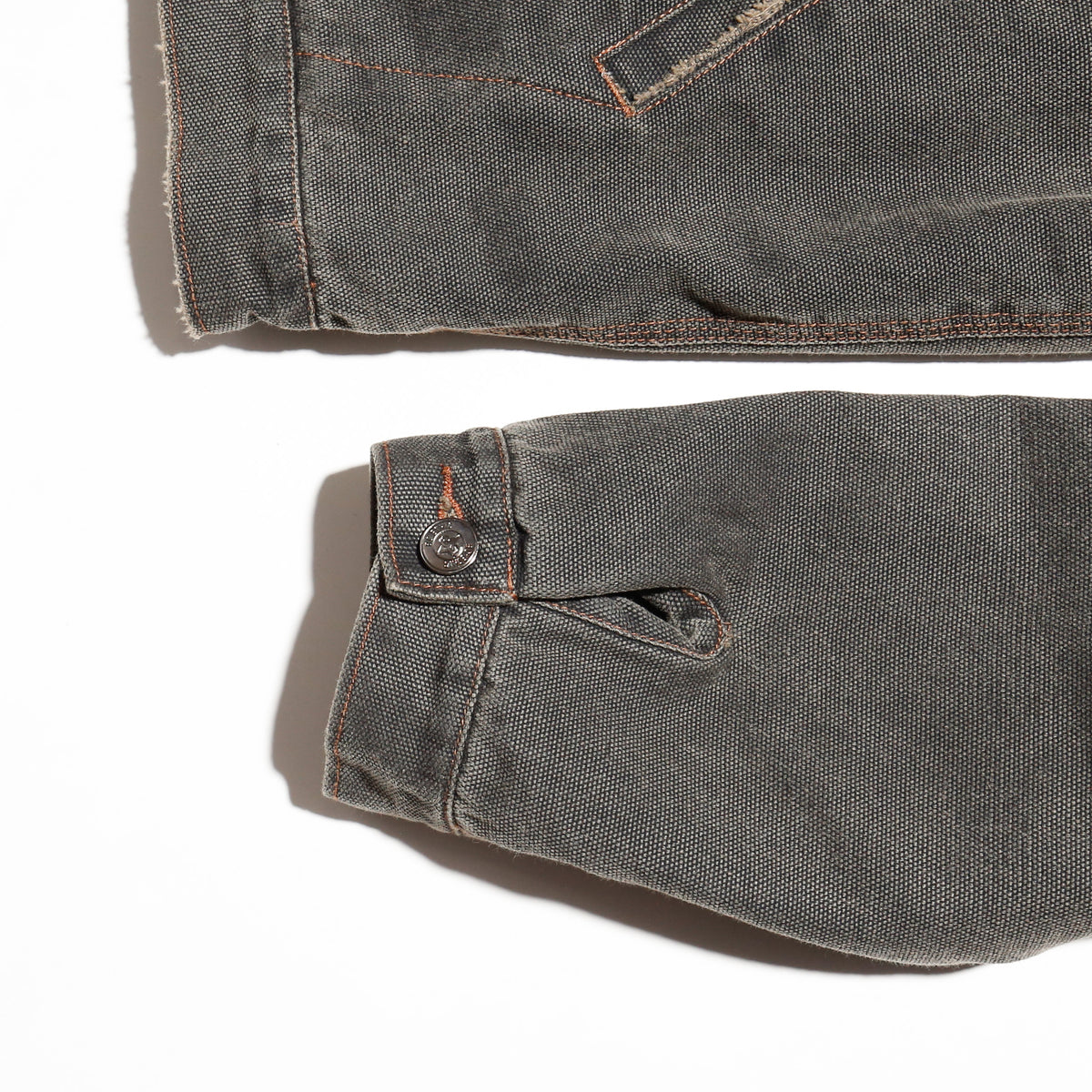vintage frayed dust work jacket ,with copper badge
