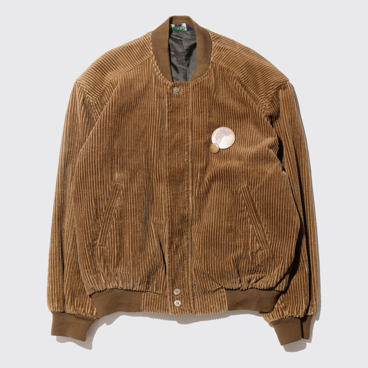 vintage corduroy bomber jacket, with copper badge