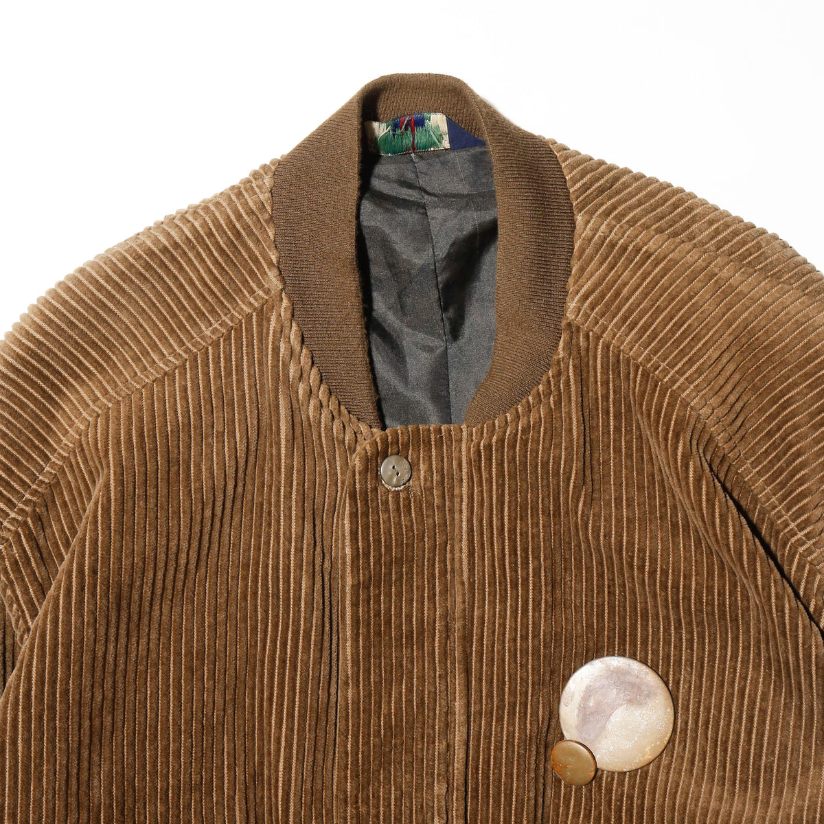vintage corduroy bomber jacket, with copper badge