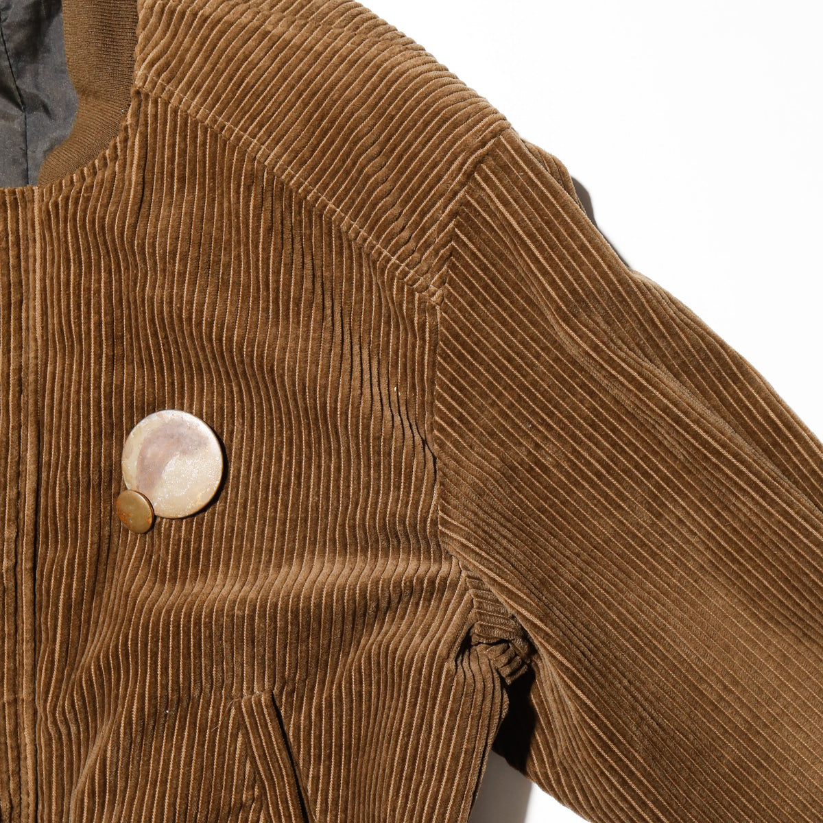 vintage corduroy bomber jacket, with copper badge