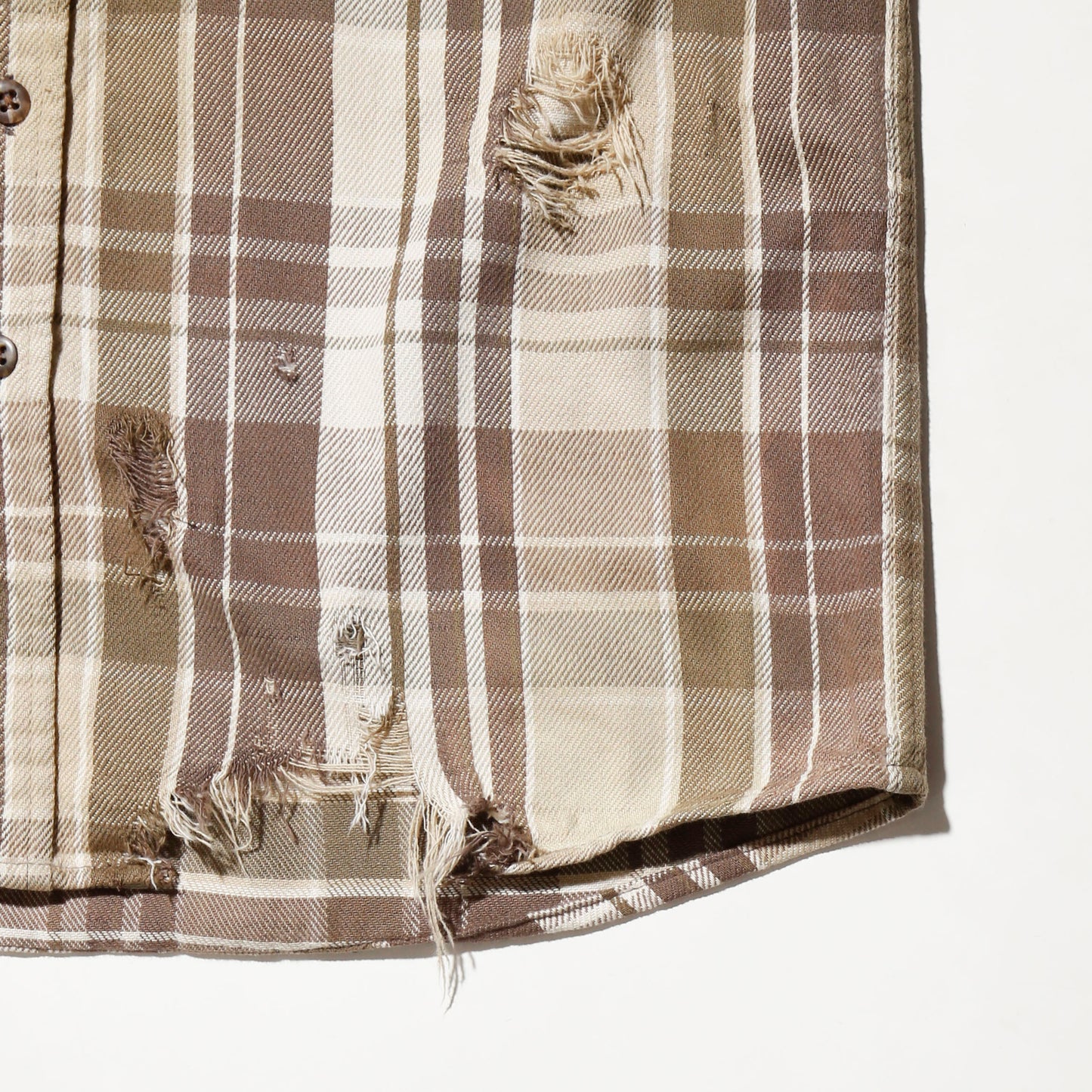 *one-off broken flannel check shirt, with copper badge