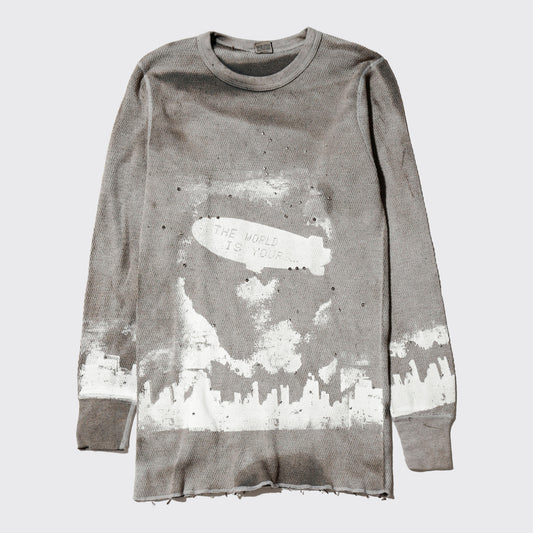 *one-off "the world is yours" hand screen l/s