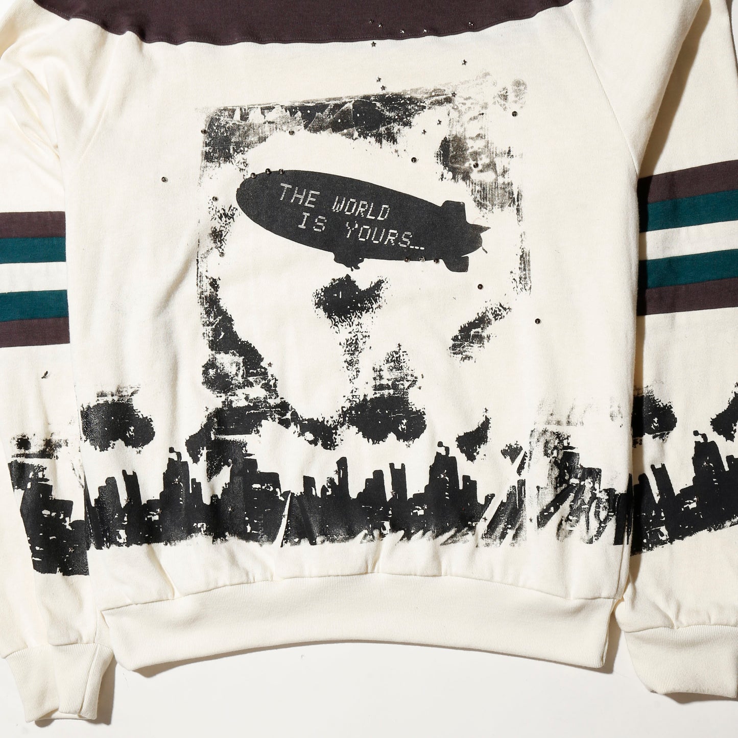 *one-off "the world is yours" hand screen sweat