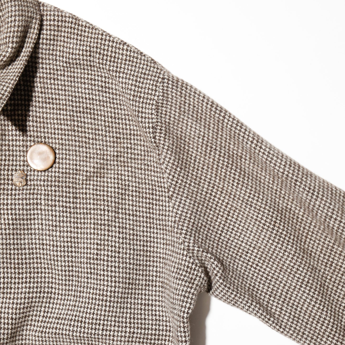 vintage herringbone wool jacket with copper badge