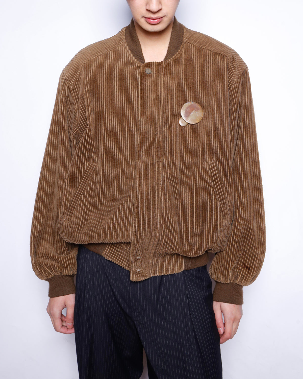 vintage corduroy bomber jacket, with copper badge