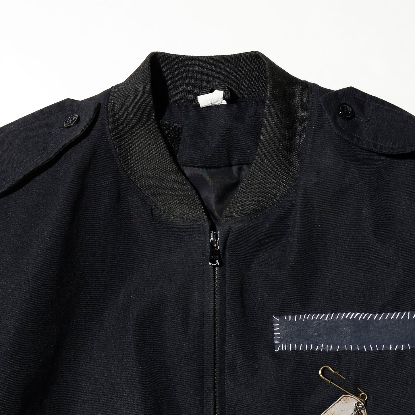 vintage officer jacket with dogtag pin