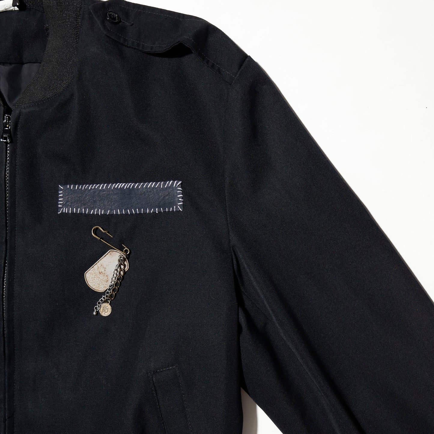 vintage officer jacket with dogtag pin