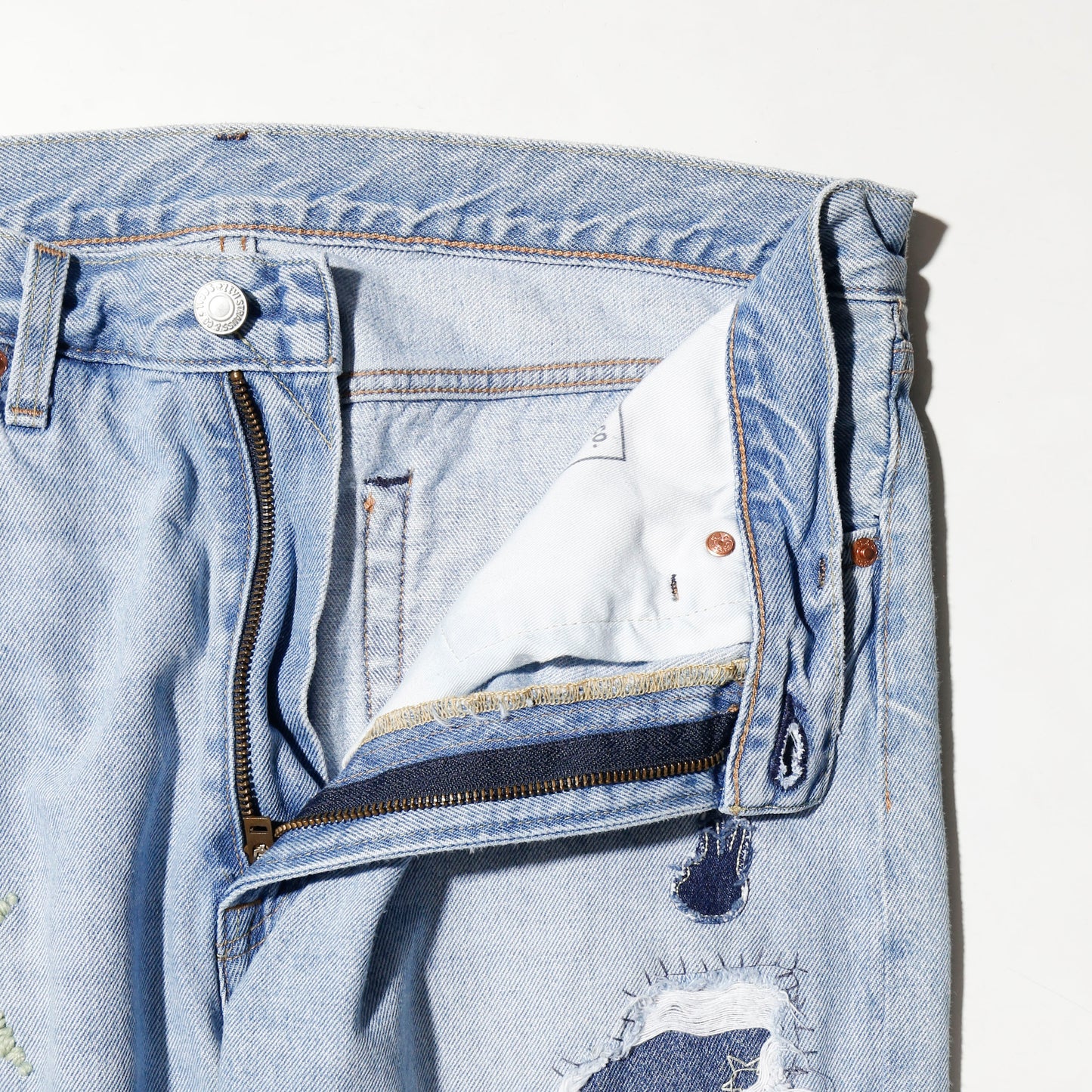 *one-off craft repaired jeans