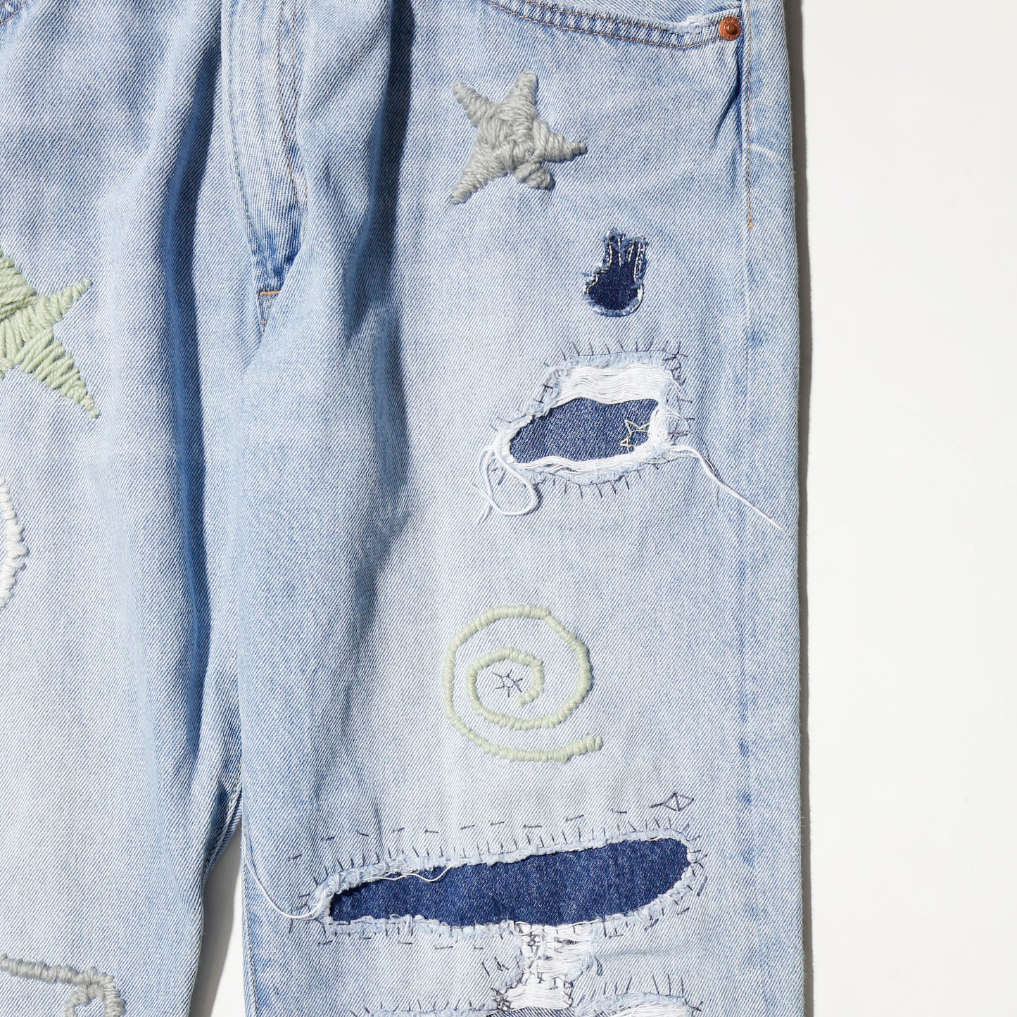 *one-off craft repaired jeans