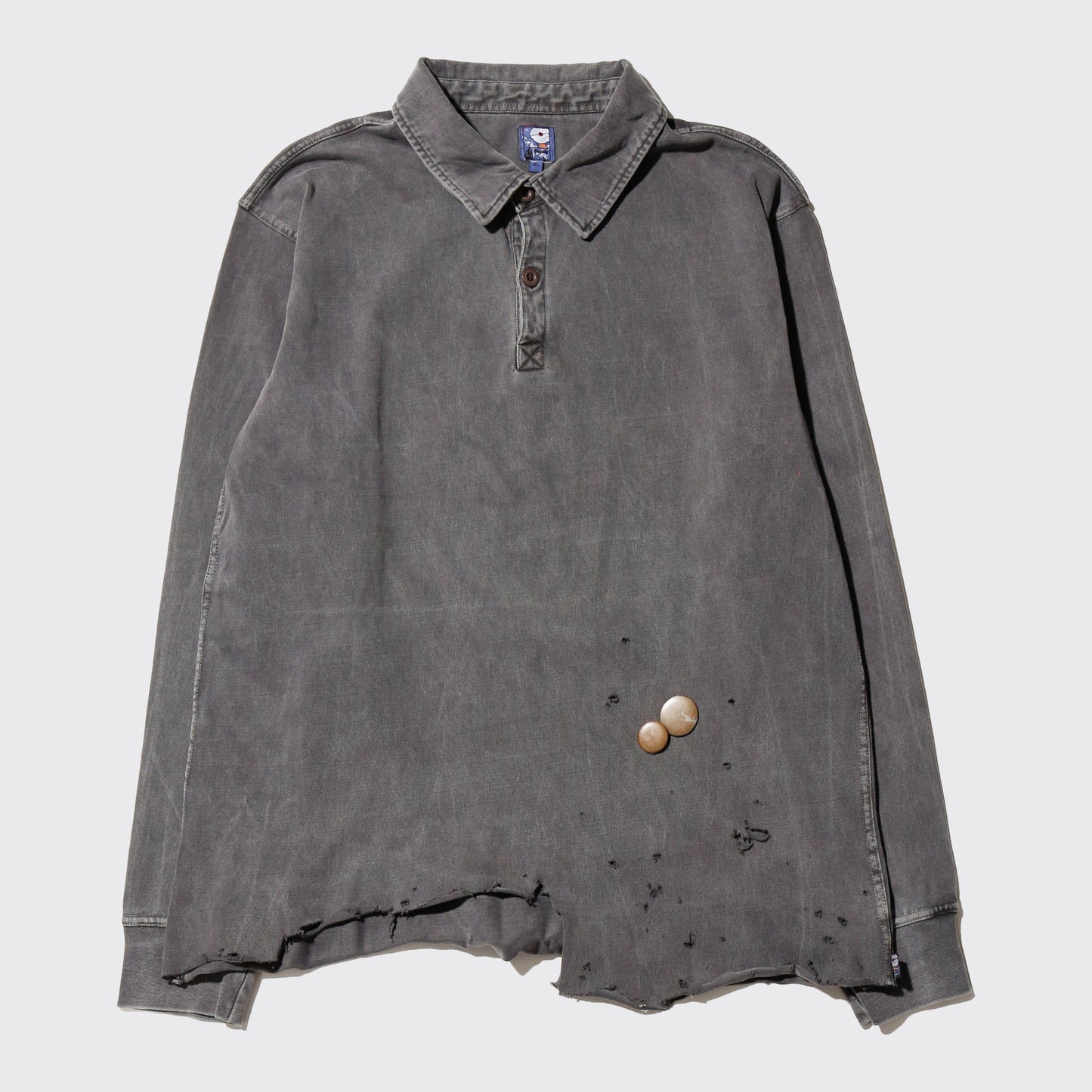 *one-off broken polo shirt, with copper badge