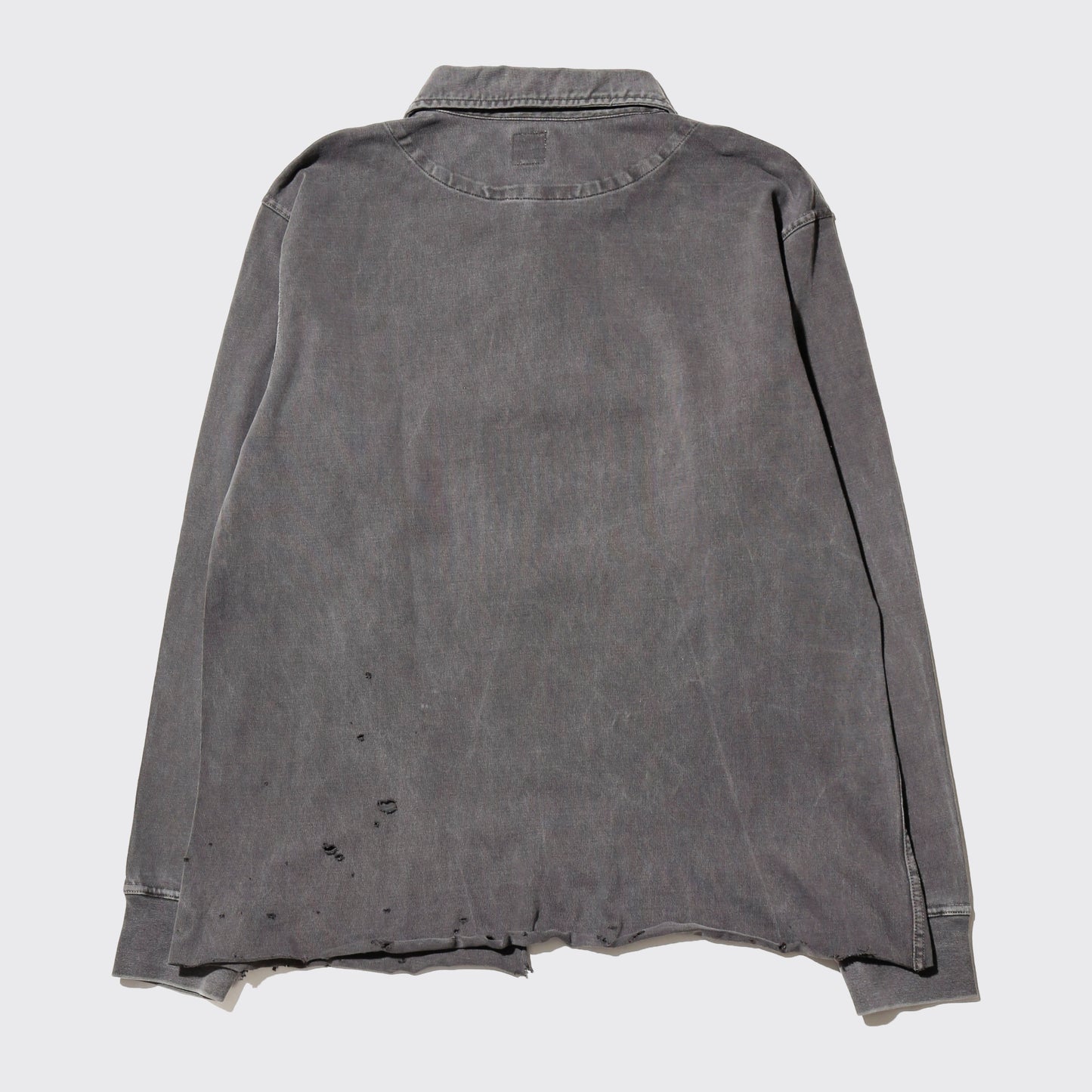 *one-off broken polo shirt, with copper badge