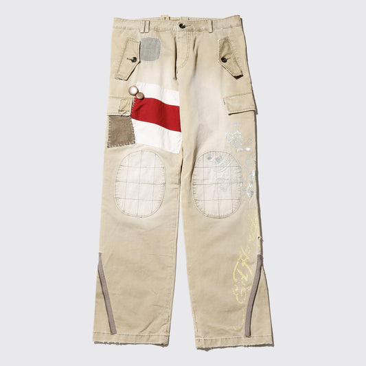 *one-off ed hardy repaired trousers, with copper badge