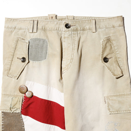 *one-off ed hardy repaired trousers, with copper badge