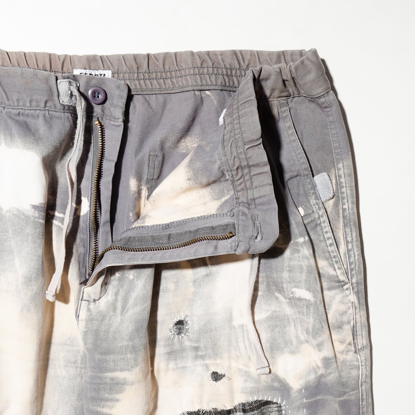 *one-off acid repaired  trousers