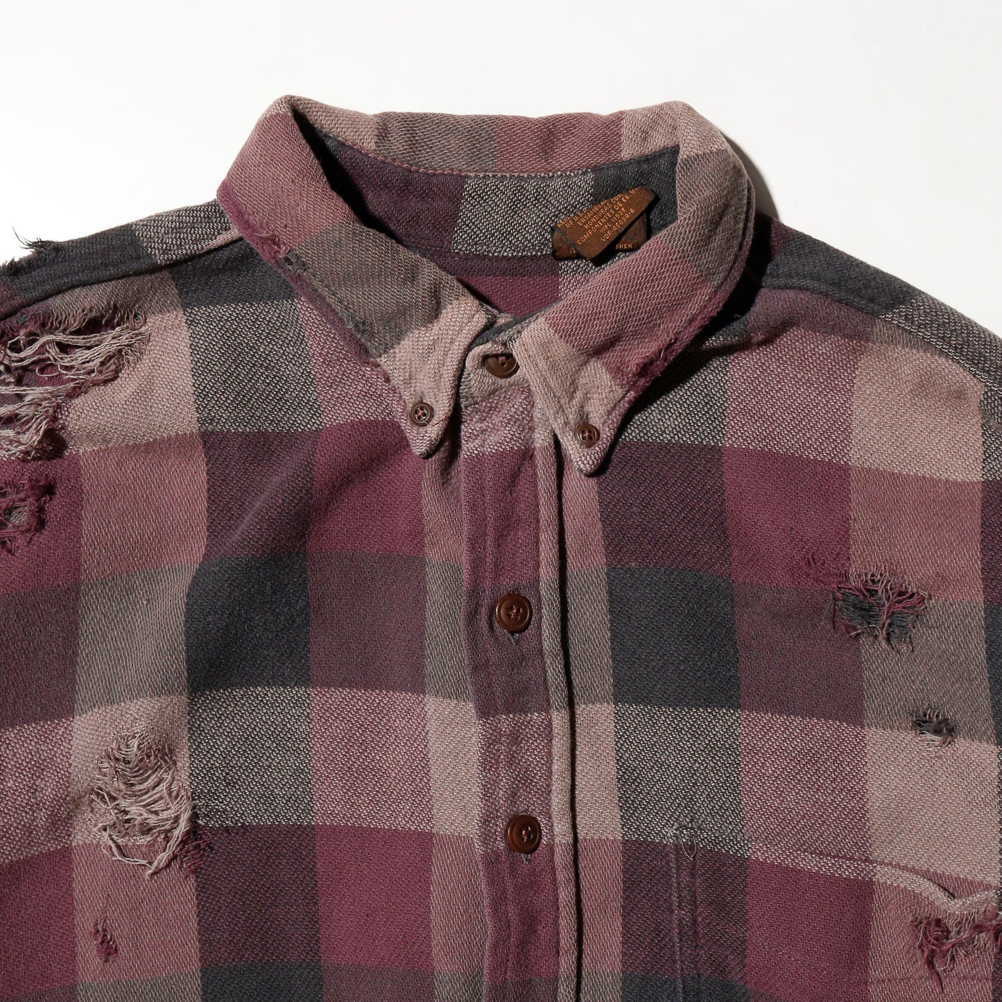 *one-off broken flannel check shirt, with copper badge