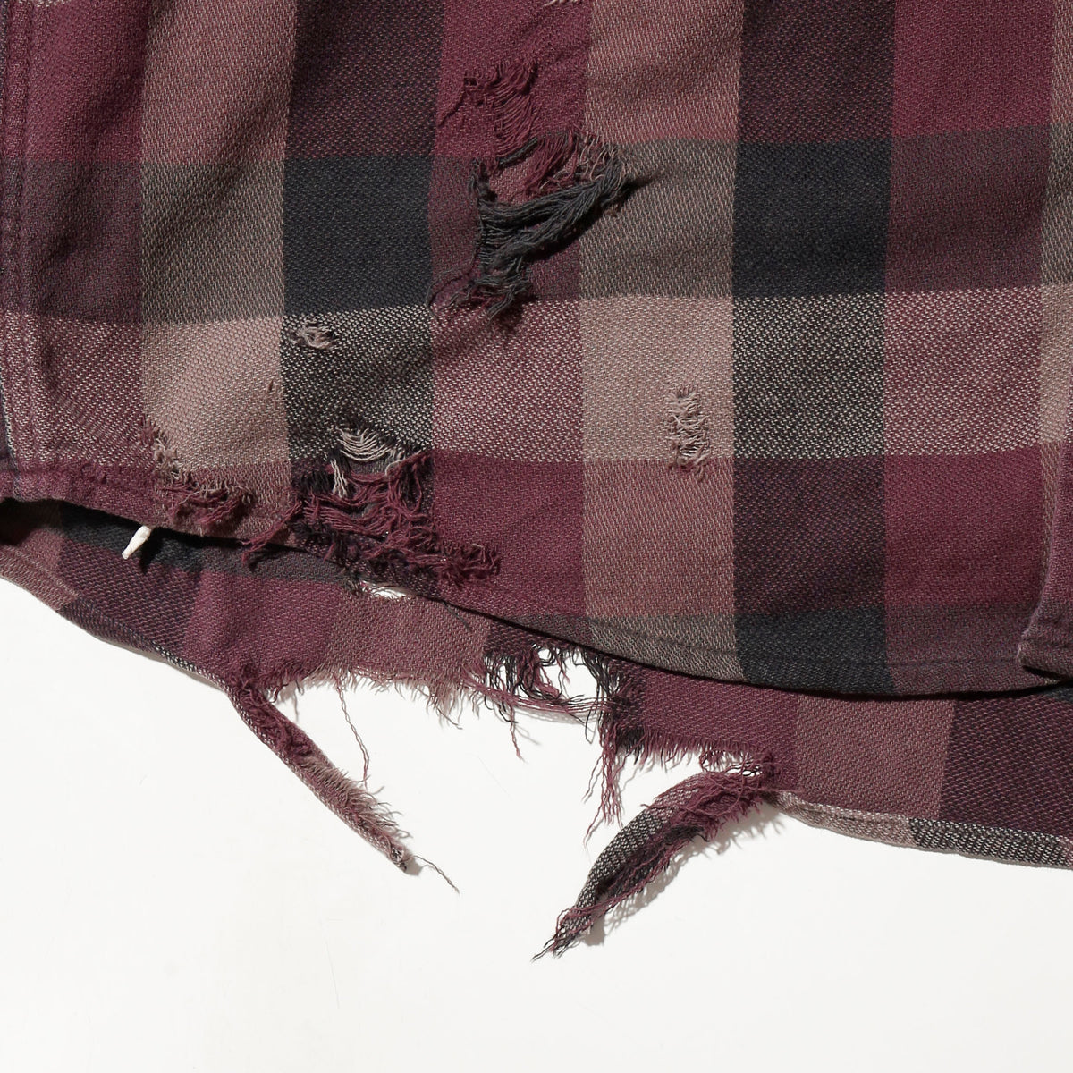 *one-off broken flannel check shirt, with copper badge