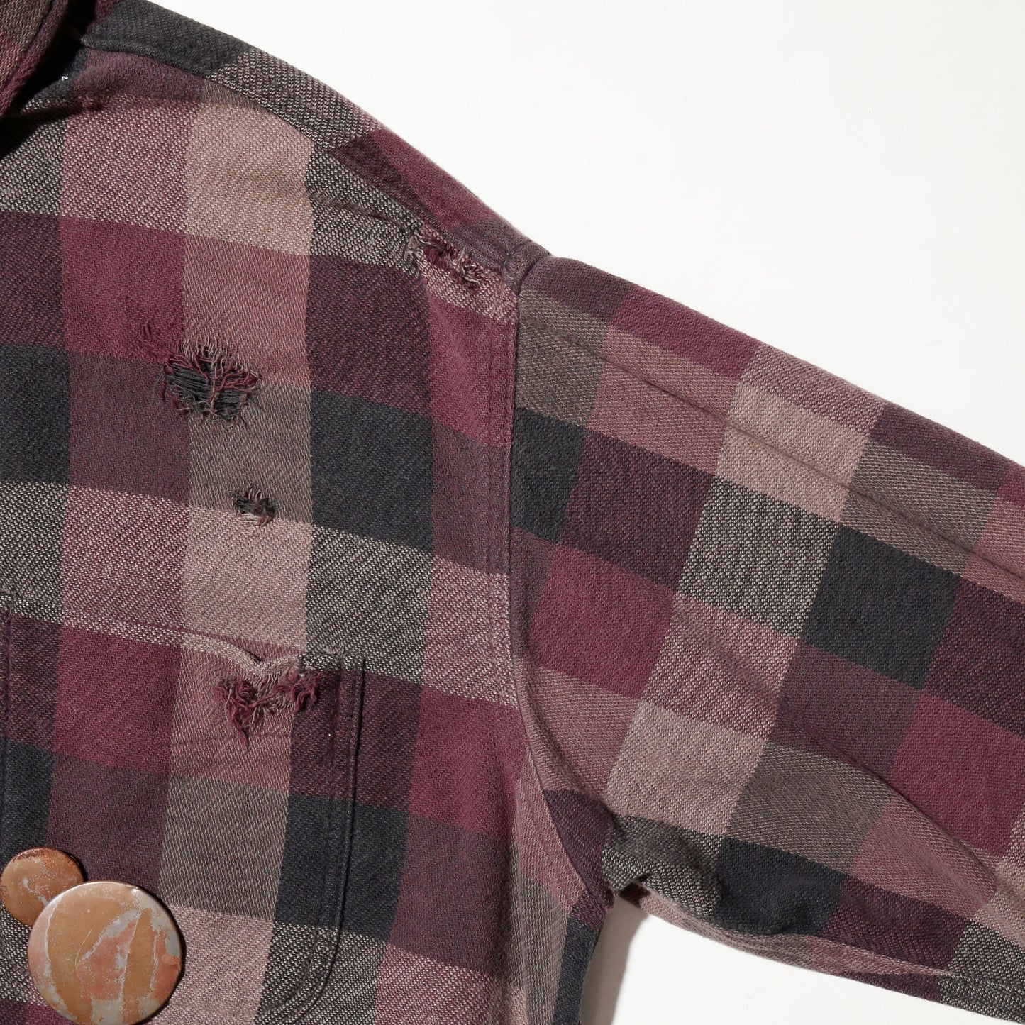 *one-off broken flannel check shirt, with copper badge