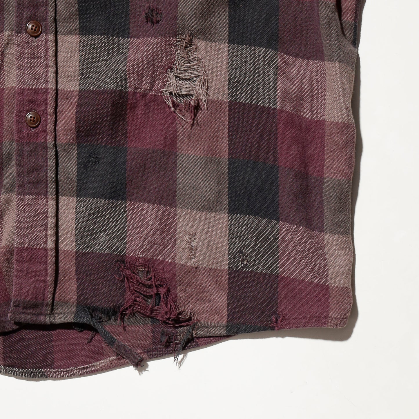 *one-off broken flannel check shirt, with copper badge