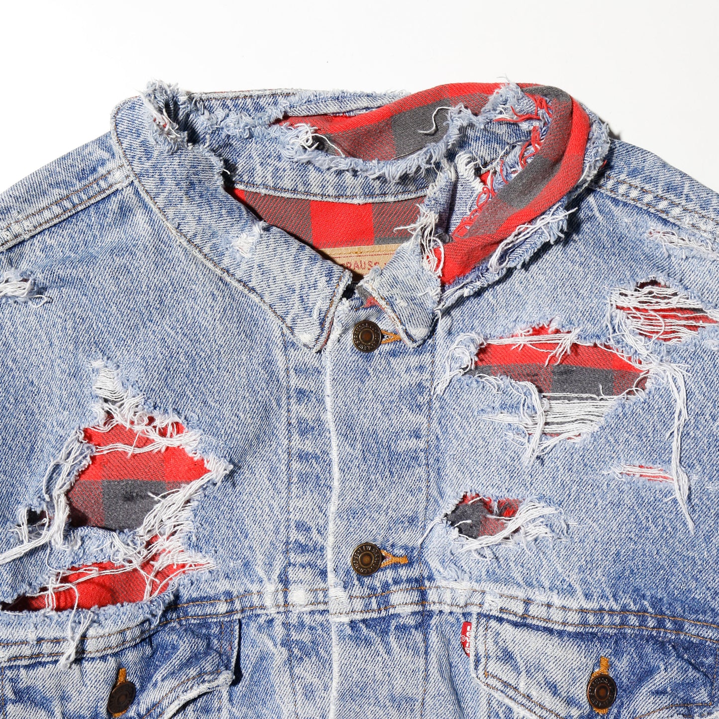 *one-off 90's Levi's broken trucker jacket , with check liner