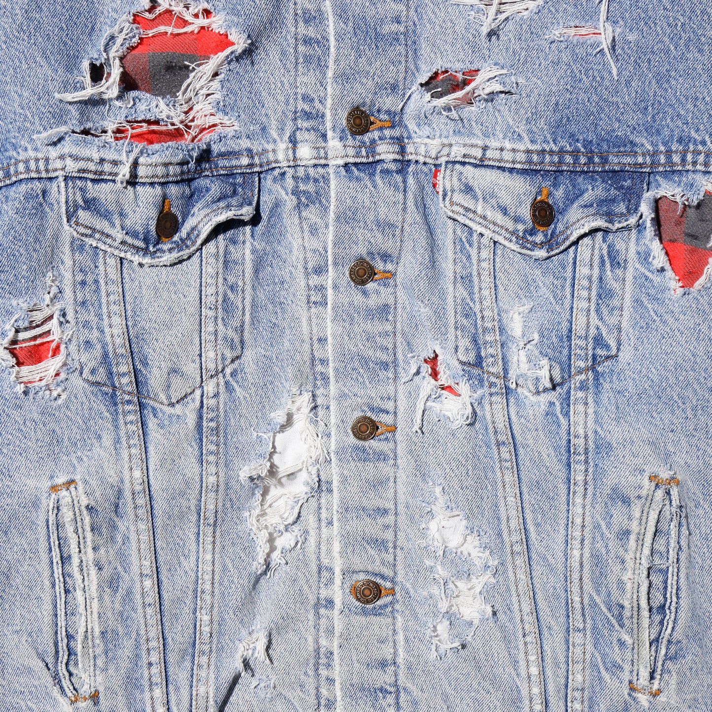 *one-off 90's Levi's broken trucker jacket , with check liner