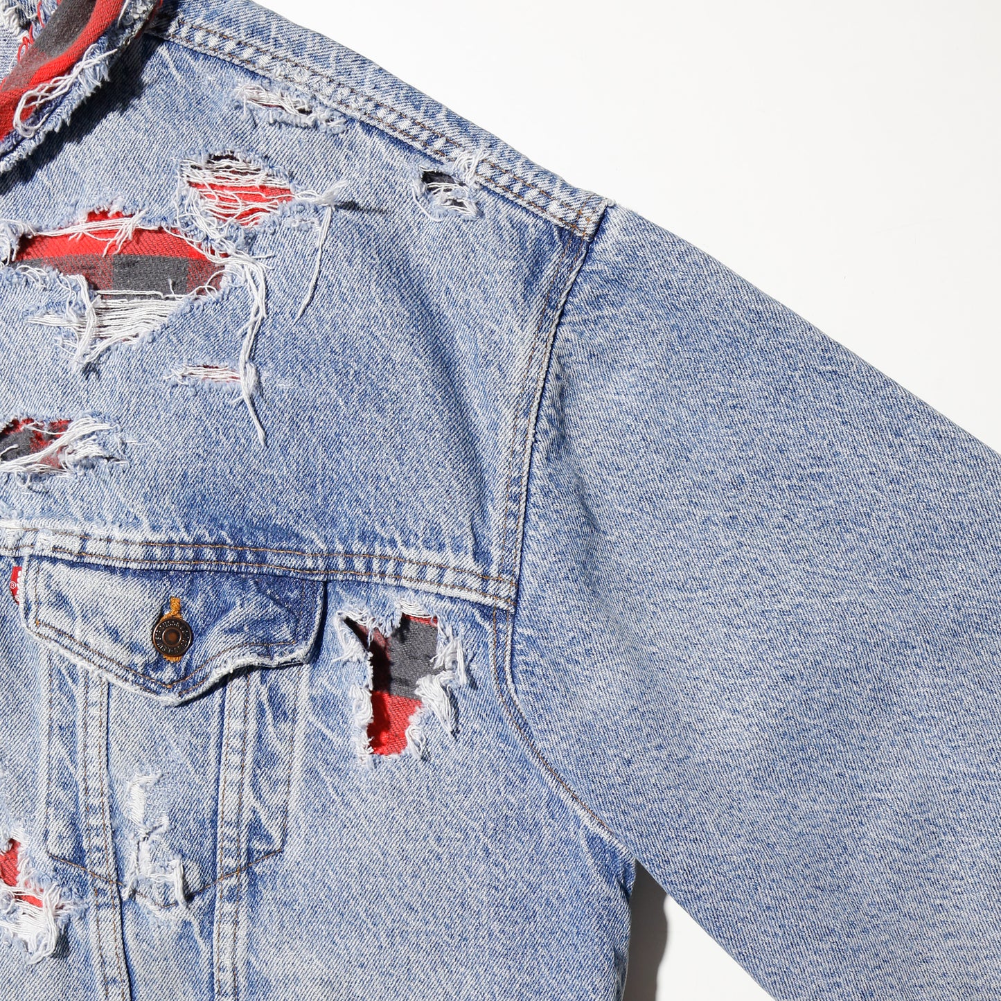 *one-off 90's Levi's broken trucker jacket , with check liner