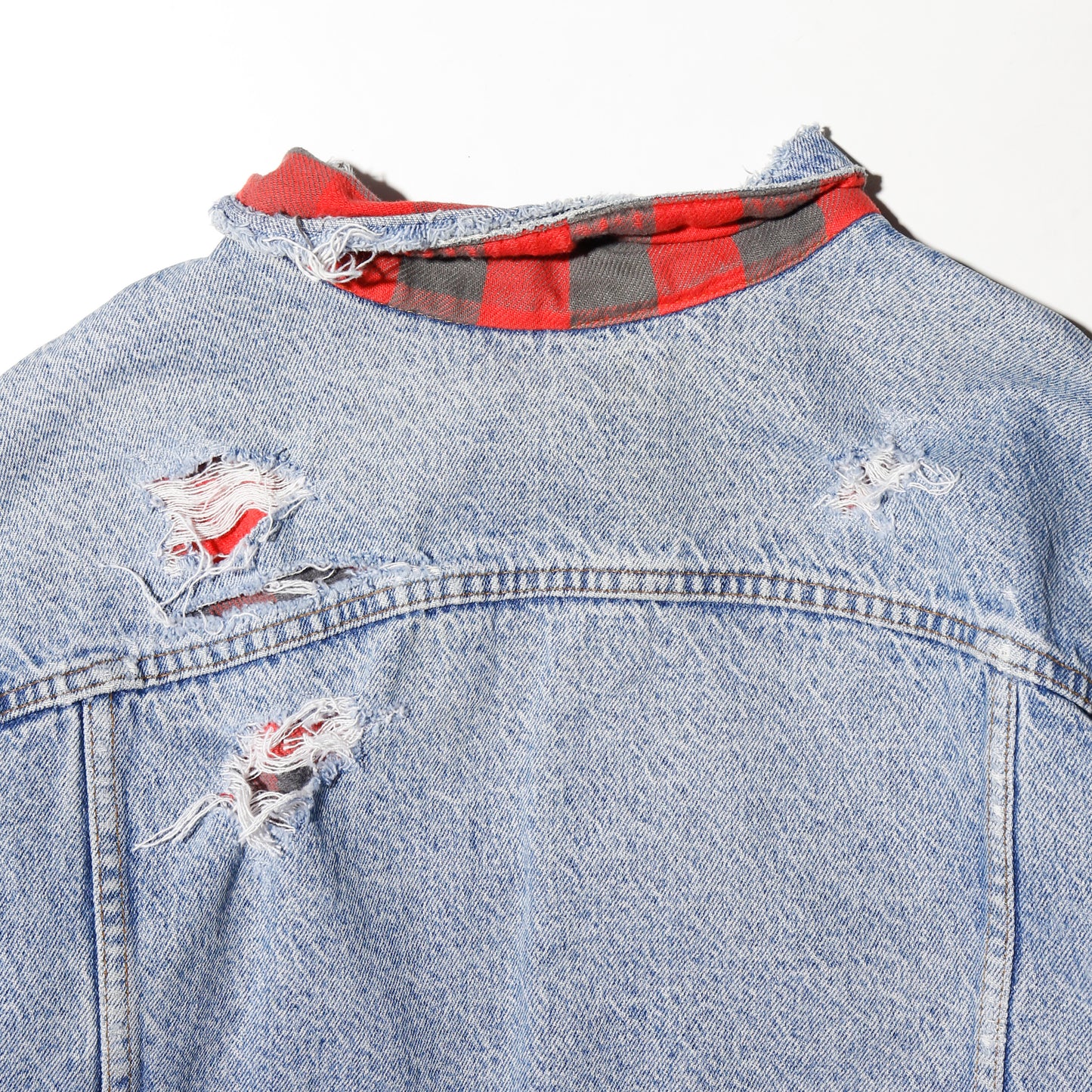 *one-off 90's Levi's broken trucker jacket , with check liner