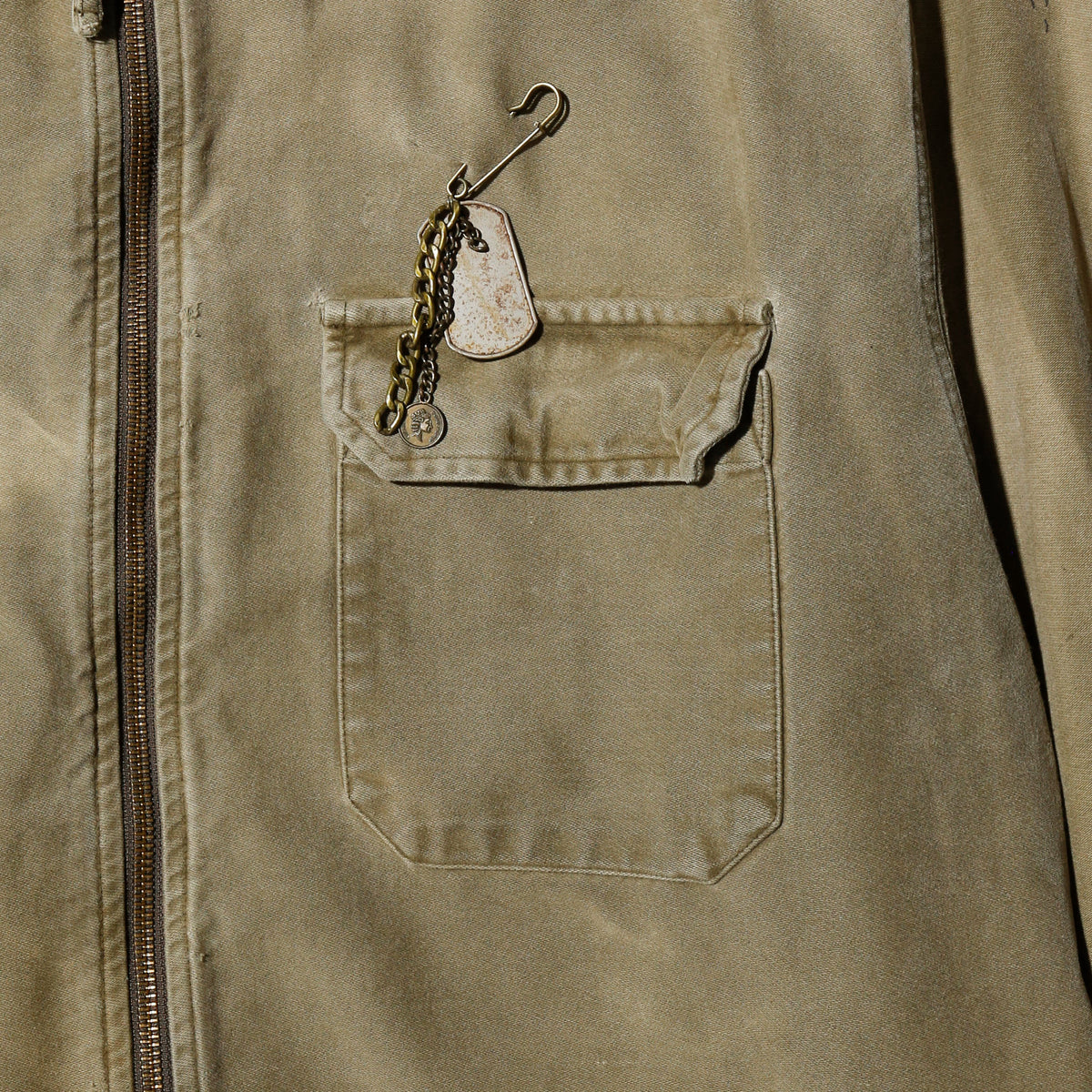 vintage distressed work jacket , with dogtag pin