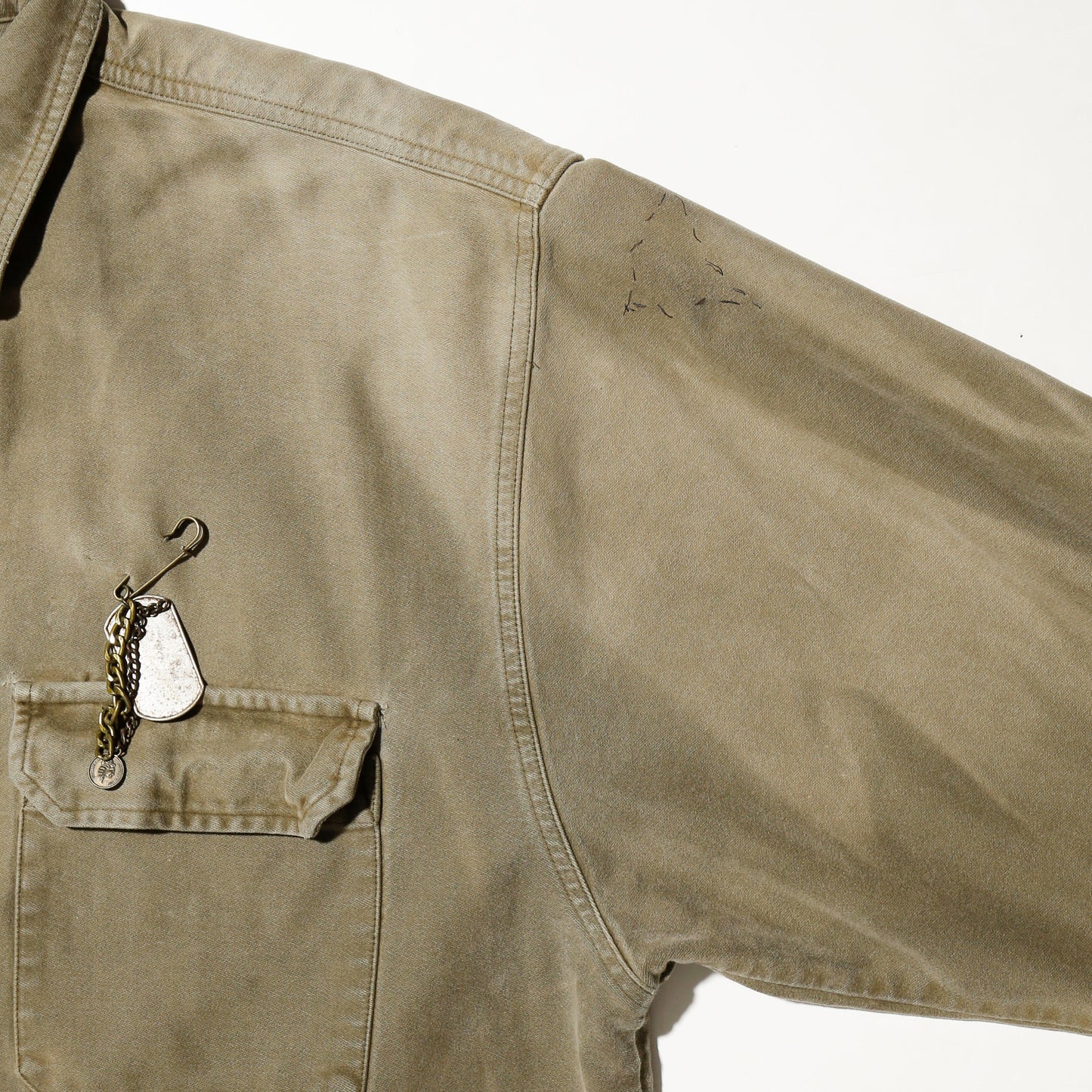 vintage distressed work jacket , with dogtag pin