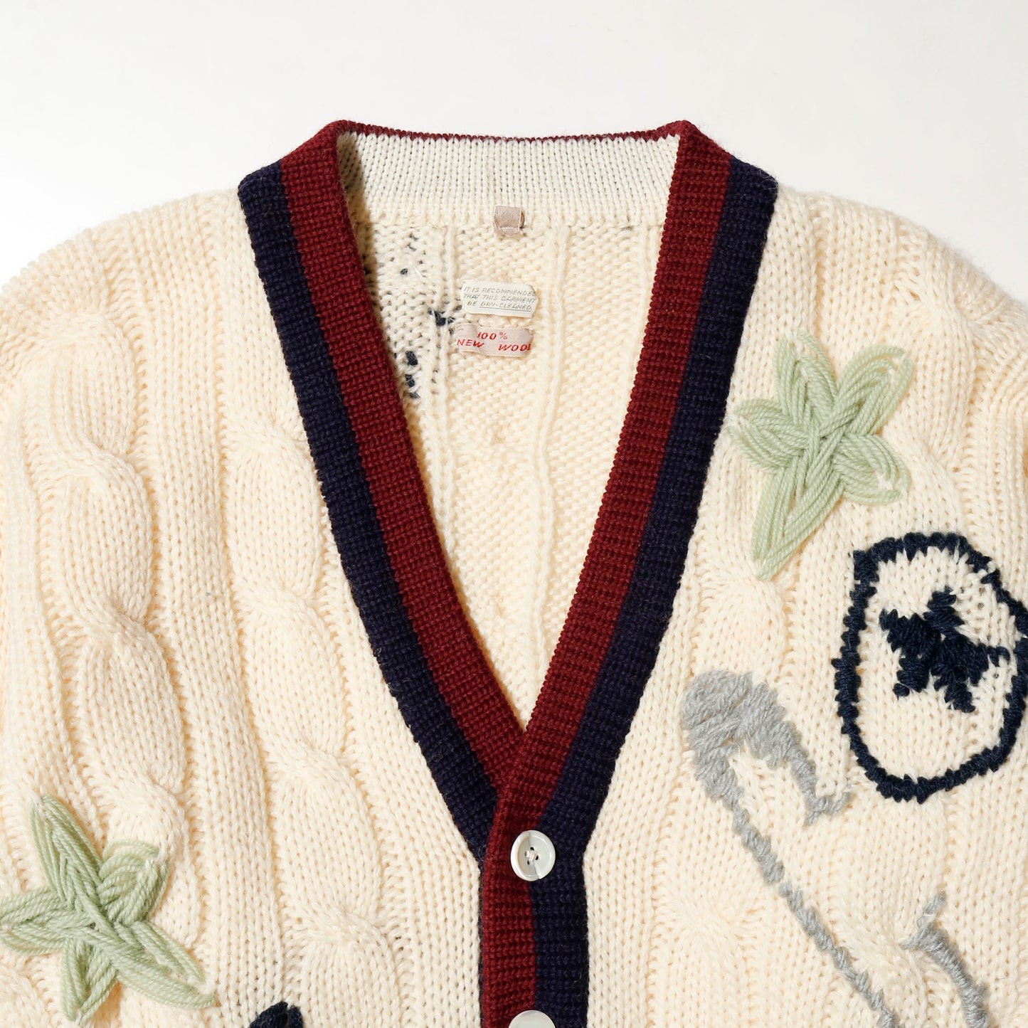 *one-off craft cricket cardigan, with copper badge