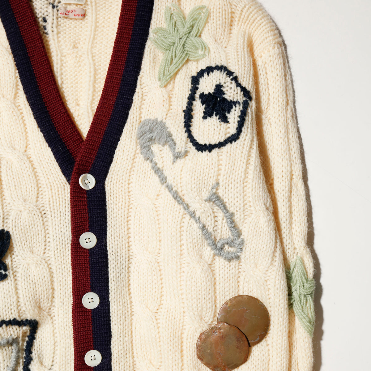 *one-off craft cricket cardigan, with copper badge