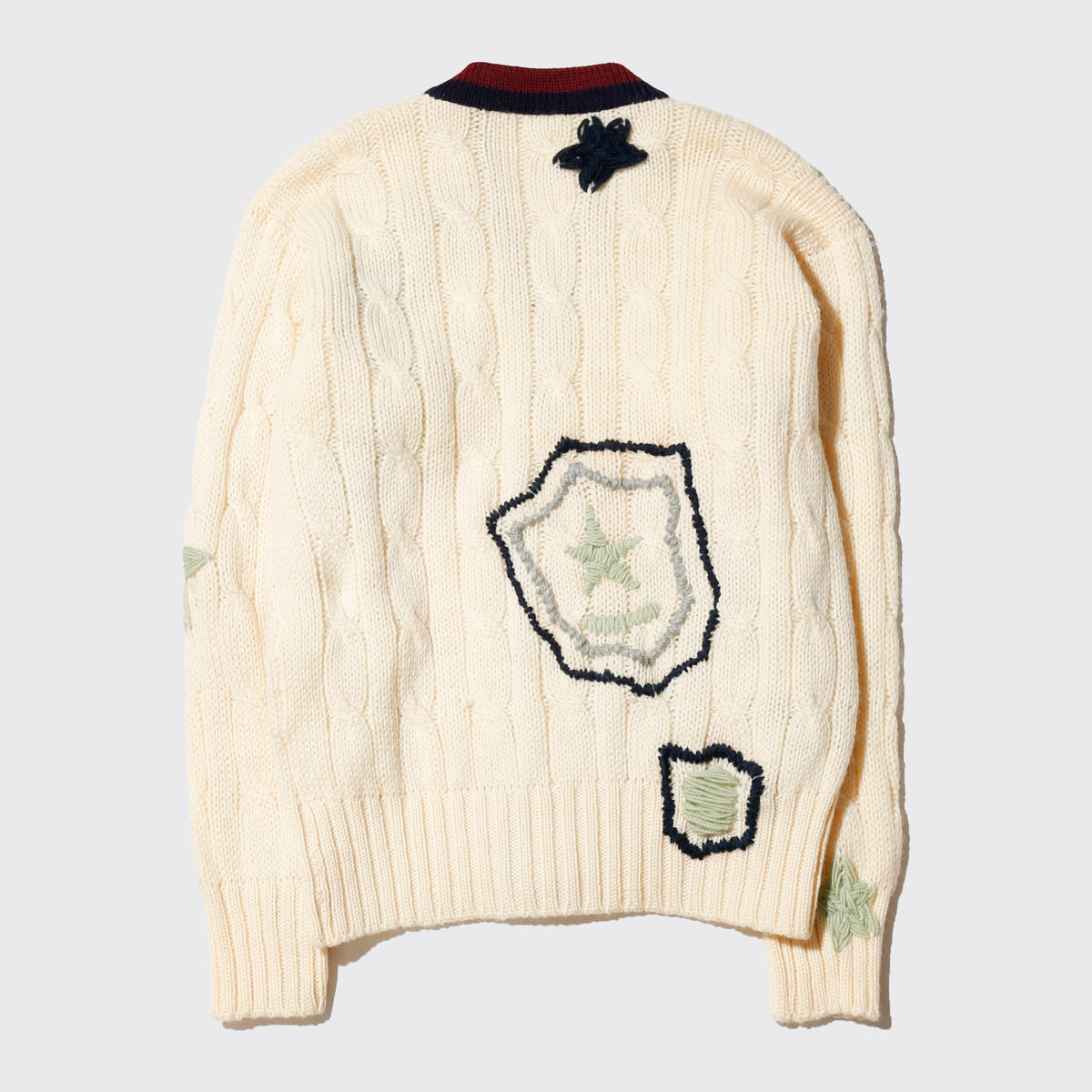 *one-off craft cricket cardigan, with copper badge