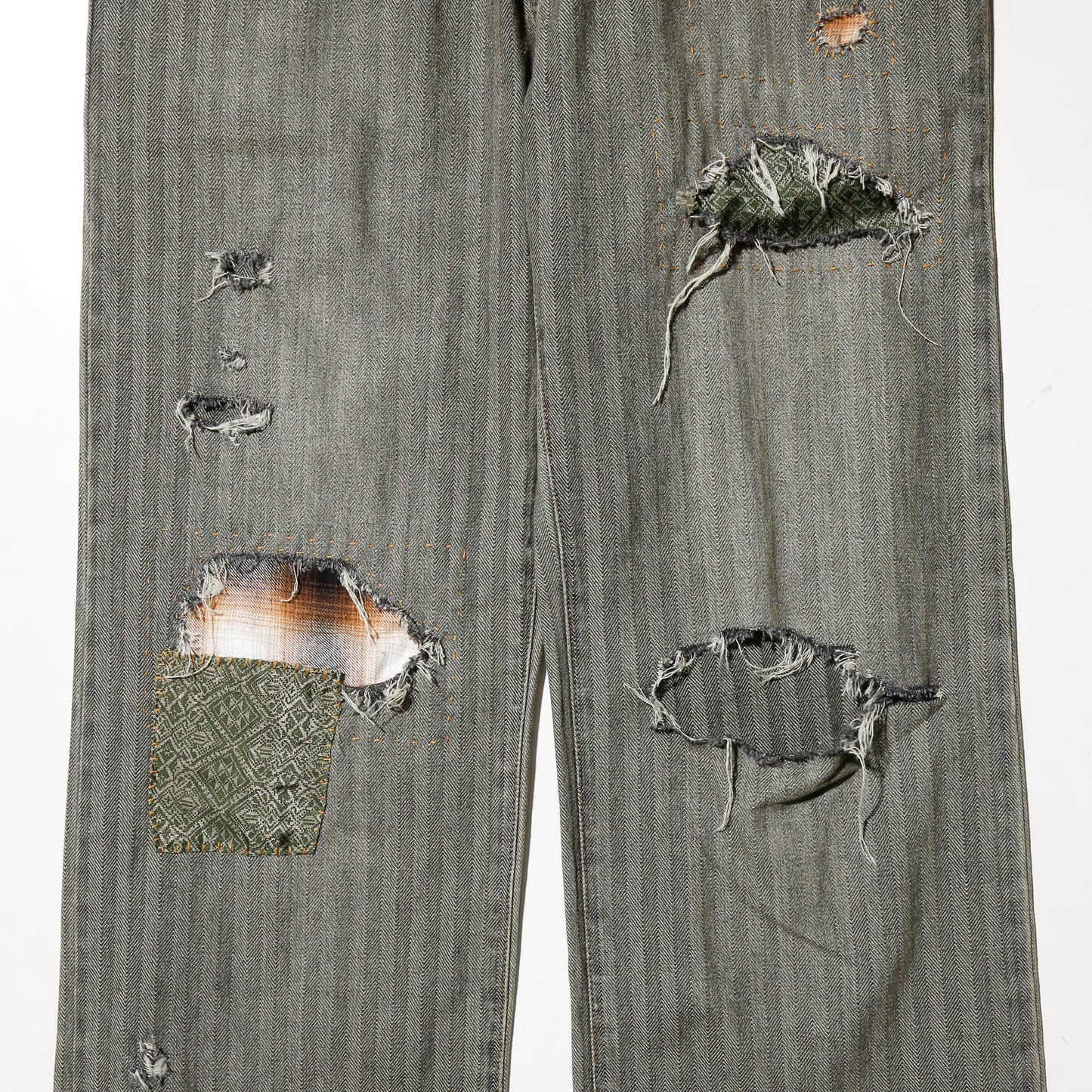 *one-off repaired herringbone jeans