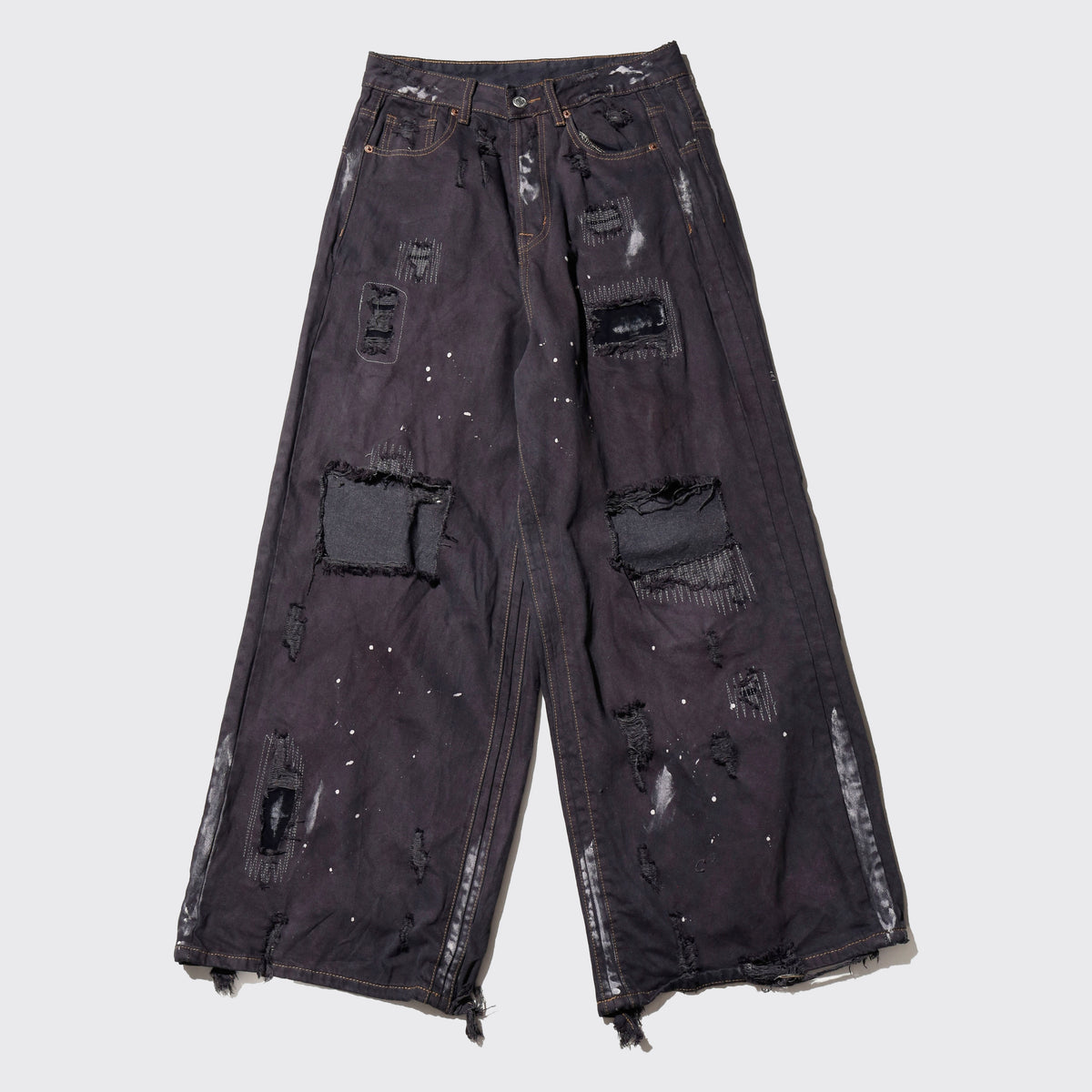 *one-off broken/repaired wide leg jeans