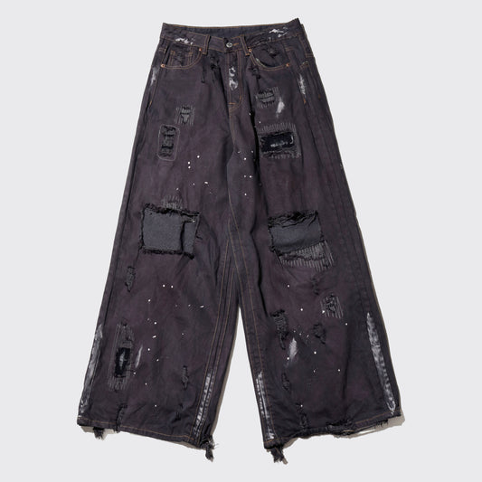 *one-off broken/repaired wide leg jeans