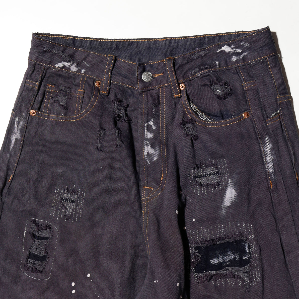 *one-off broken/repaired wide leg jeans