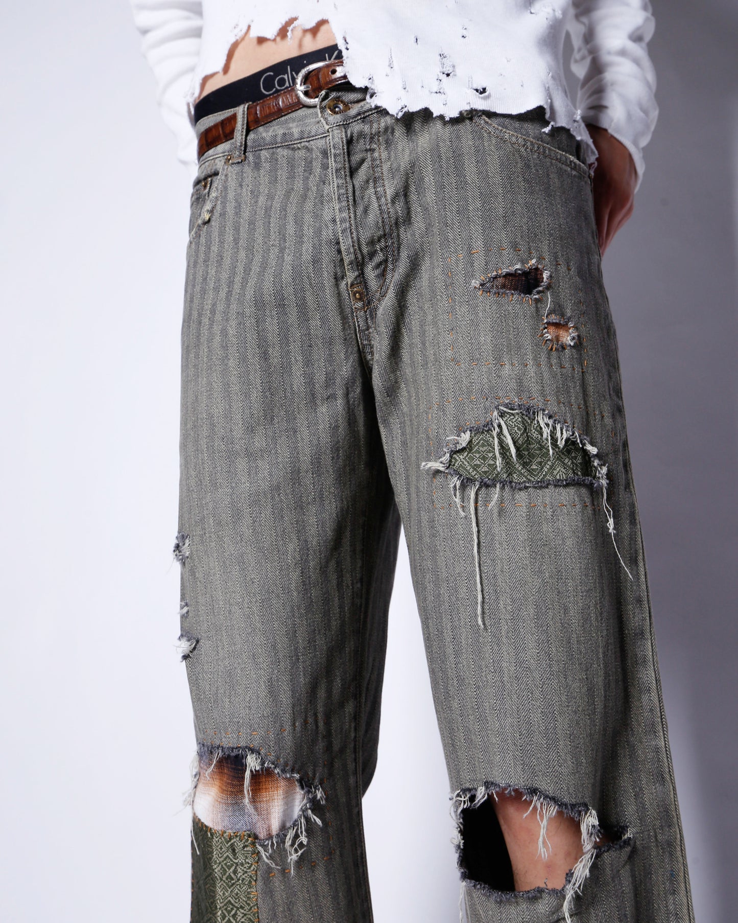 *one-off repaired herringbone jeans