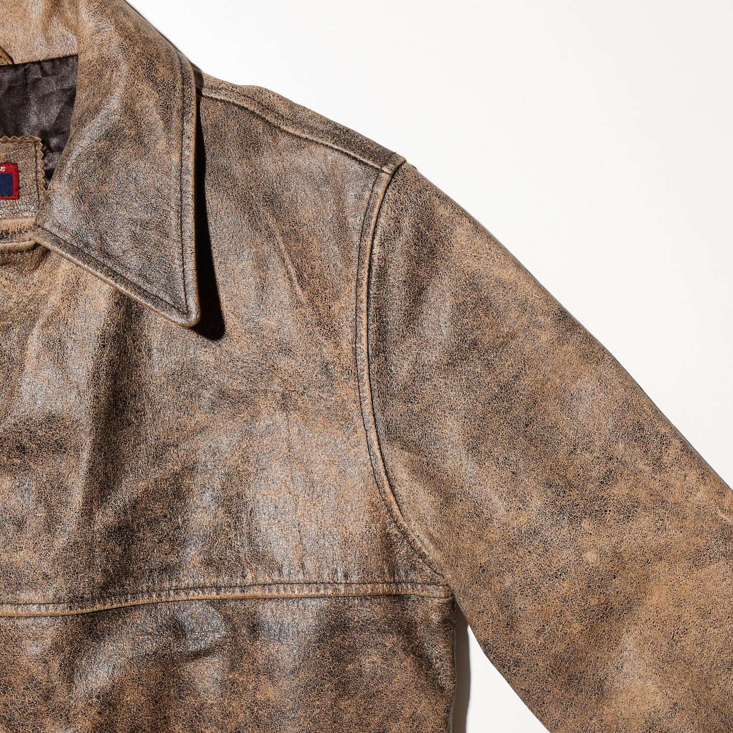 vintage faded leather coat