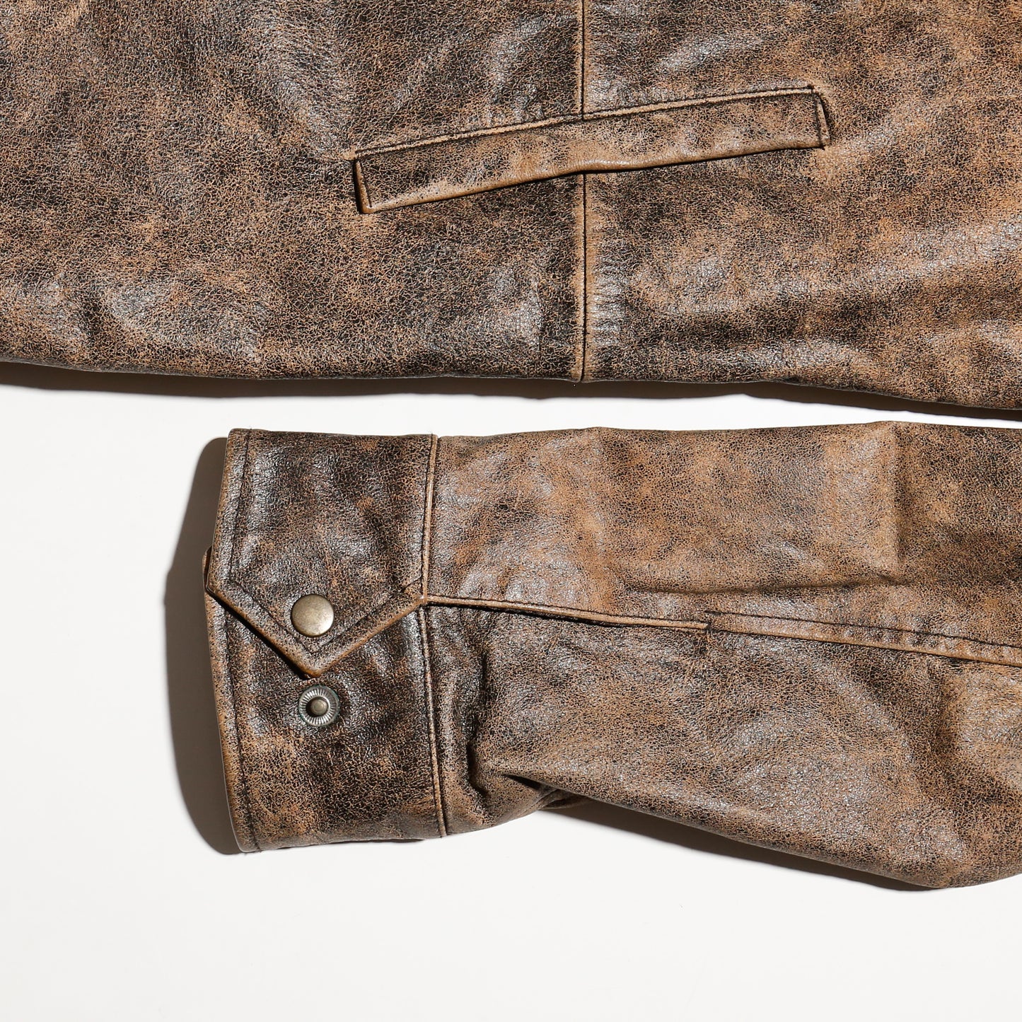 vintage faded leather coat
