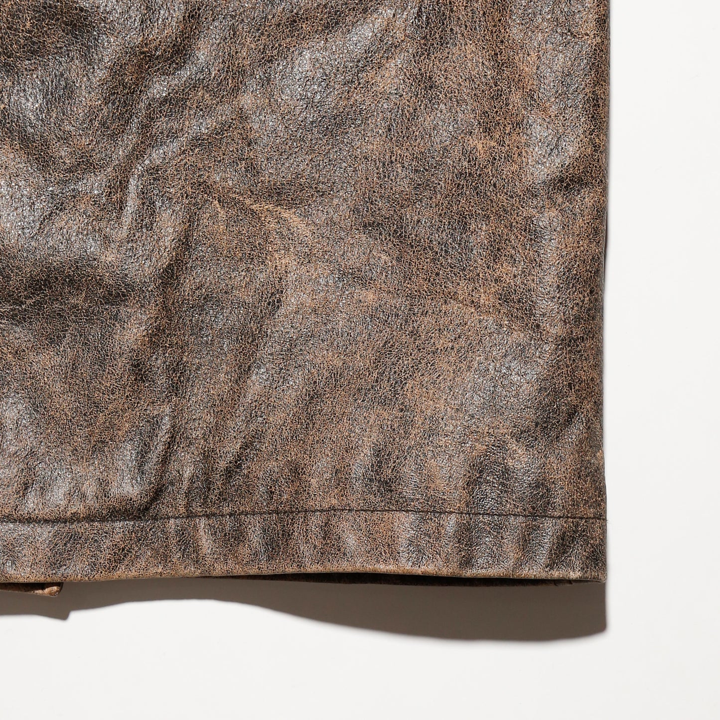 vintage faded leather coat