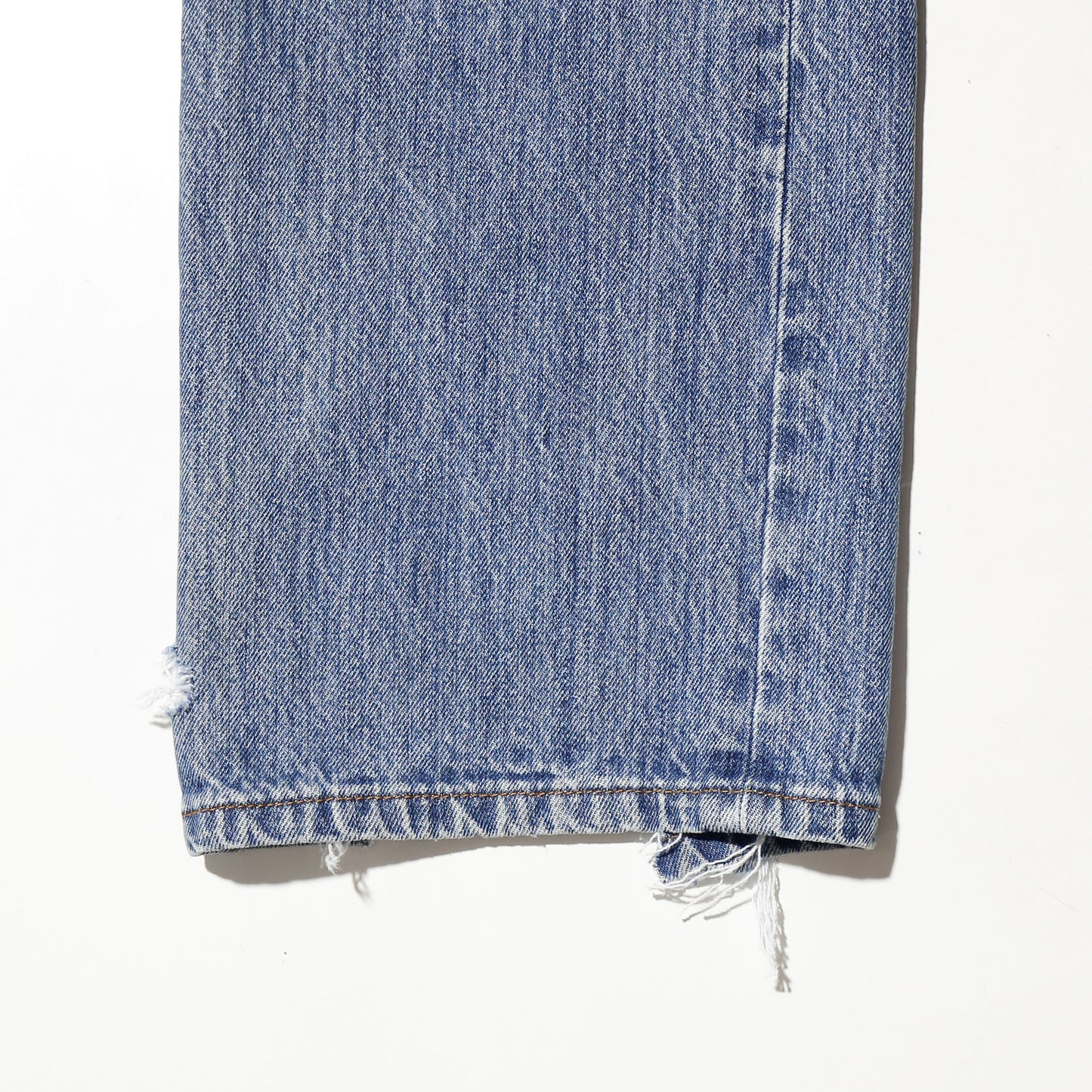 *one-off broken layered jeans